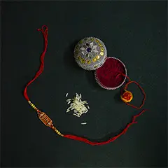 Sisters tying rakhi